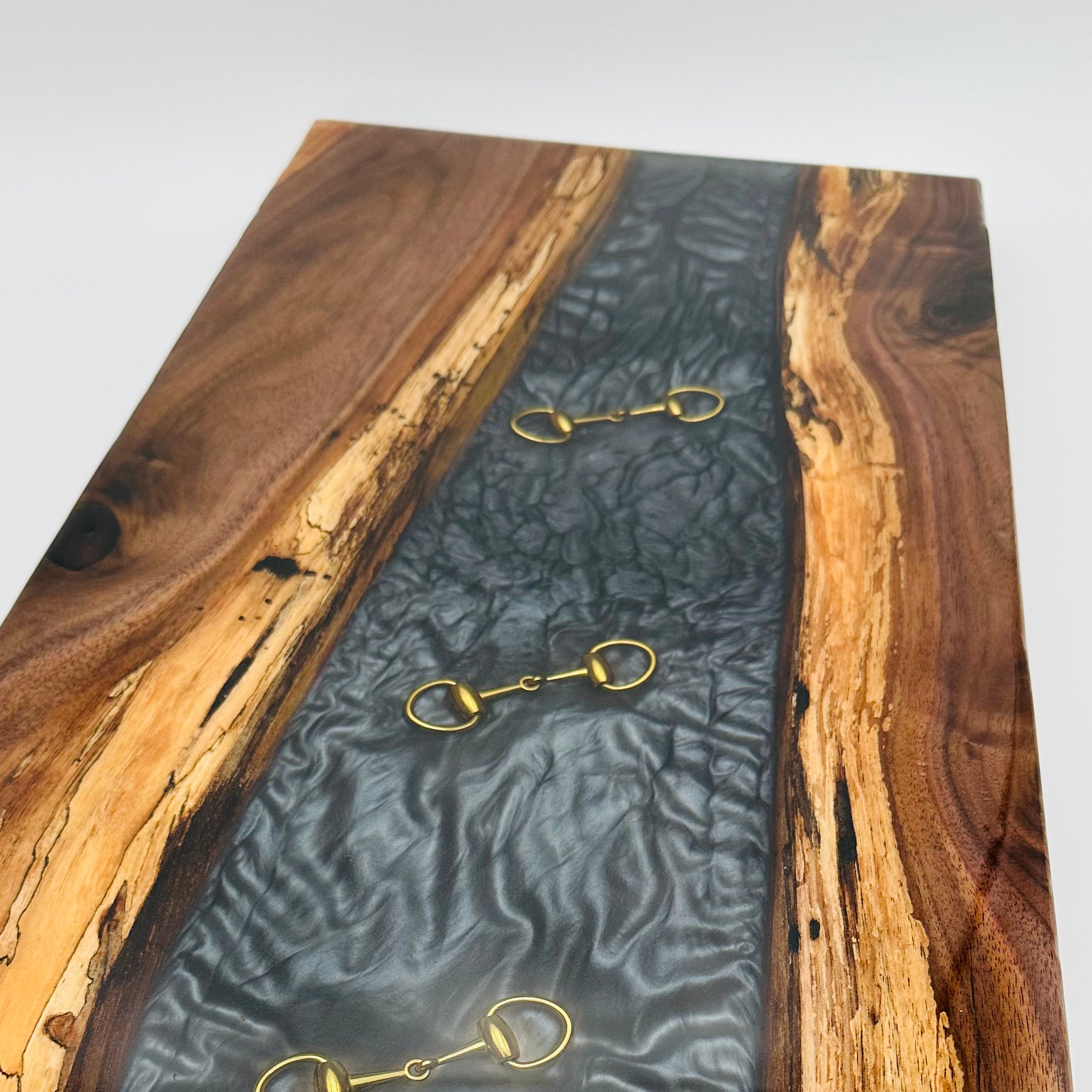 Handcrafted Black Walnut Charcuterie Board with Black Resin Inlaid with Gold Bridle Bit