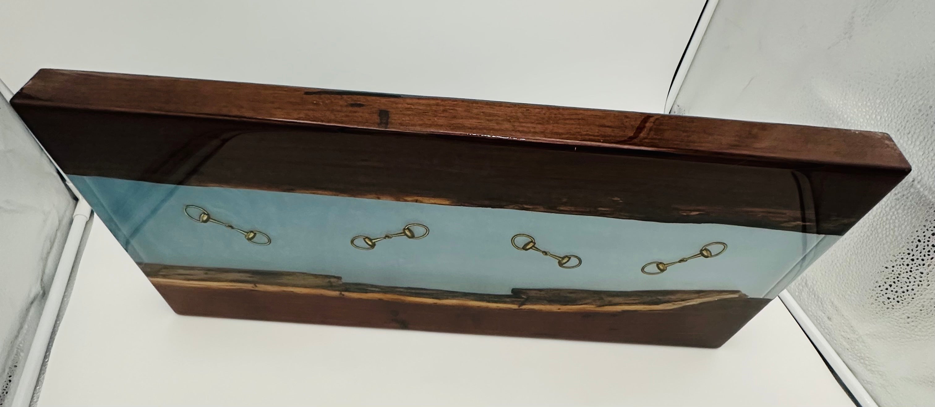Handcrafted Black Walnut Charcuterie Board with Iceberg blue Resin Inlaid with Gold Bridle Bit