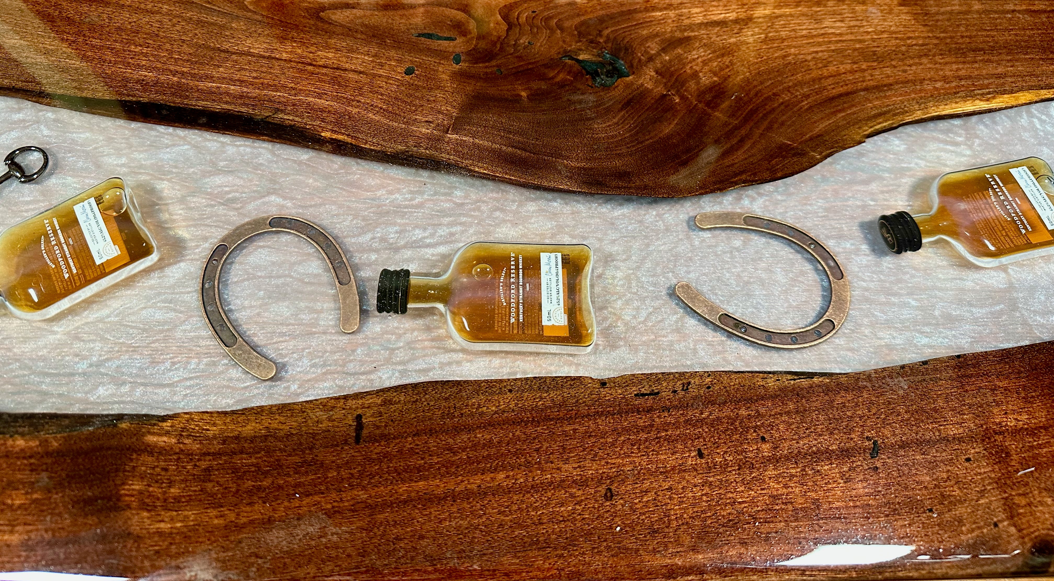 Handcrafted Black Walnut Charcuterie Board with White Resin, Bourbon, Horseshoe & Bridle Bit Center: A Toast to Kentucky Tradition